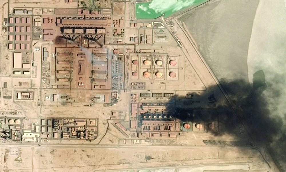 A satellite image shows smoke rising from Subiya Power and Water Desalination Plant, in Subiya Kuwait. — Reuters