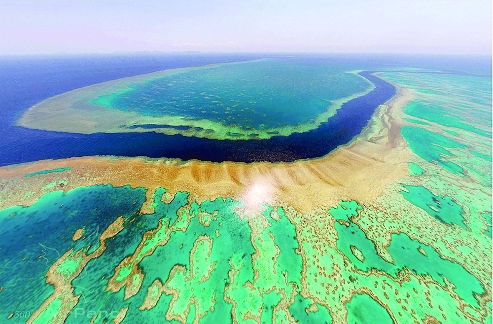 The Great Barrier Reef, which stretches along the Queensland coast, is the world's largest coral reef system.