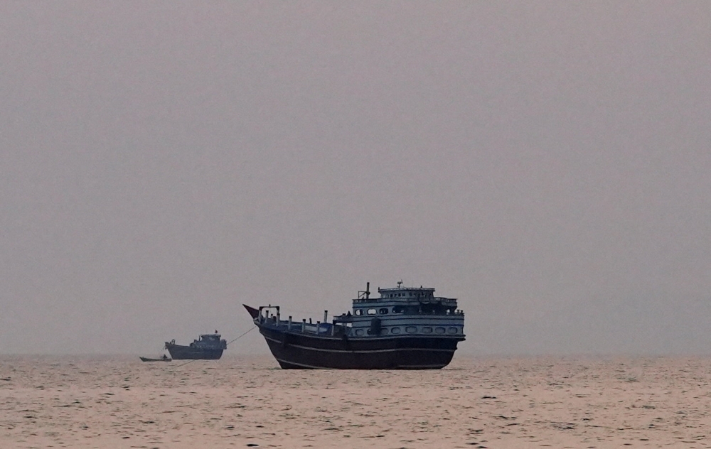 Vessels at the Strait of Hormuz, as seen from Musandam, Oman, July 21, 2026. REUTERS/Stringer
