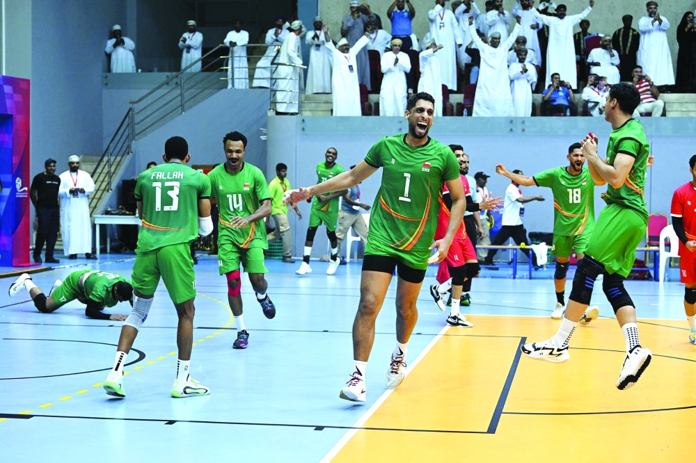 Oman players celebrate after the match. — Abdulwahid al Hamadani