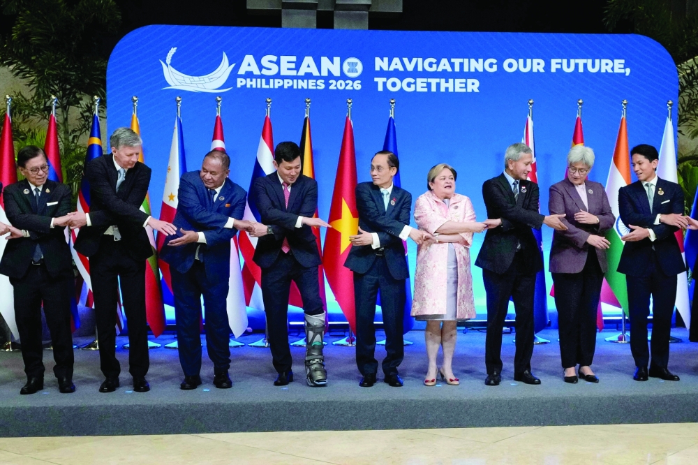Thailand's Foreign Minister Sihasak Phuangketkeow, Russia’s ambassador to Asean Evgeny Zagaynov, East Timor's Foreign Minister Bendito Santos Frietas, US Ambassador to Asean Kevin Kim, Vietnam's Foreign Minister Le Hoai Trung, Philippine Foreign Secretary Theresa Lazaro, Singapore's Foreign Minister Vivian Balakrishnan, Australia's Foreign Minister Penny Wong and Brunei's Foreign Minister Abdul Mateen Bolkiah at the Asean Foreign Ministers Meeting in Pasay, Metro Manila. — AFP