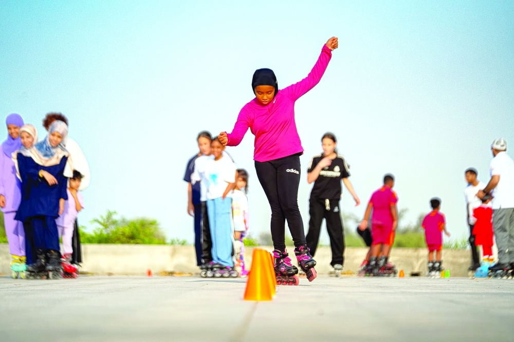 Participants showcase their roller-skating skills during the Roller Skating Open Day at Al Seeb corniche.