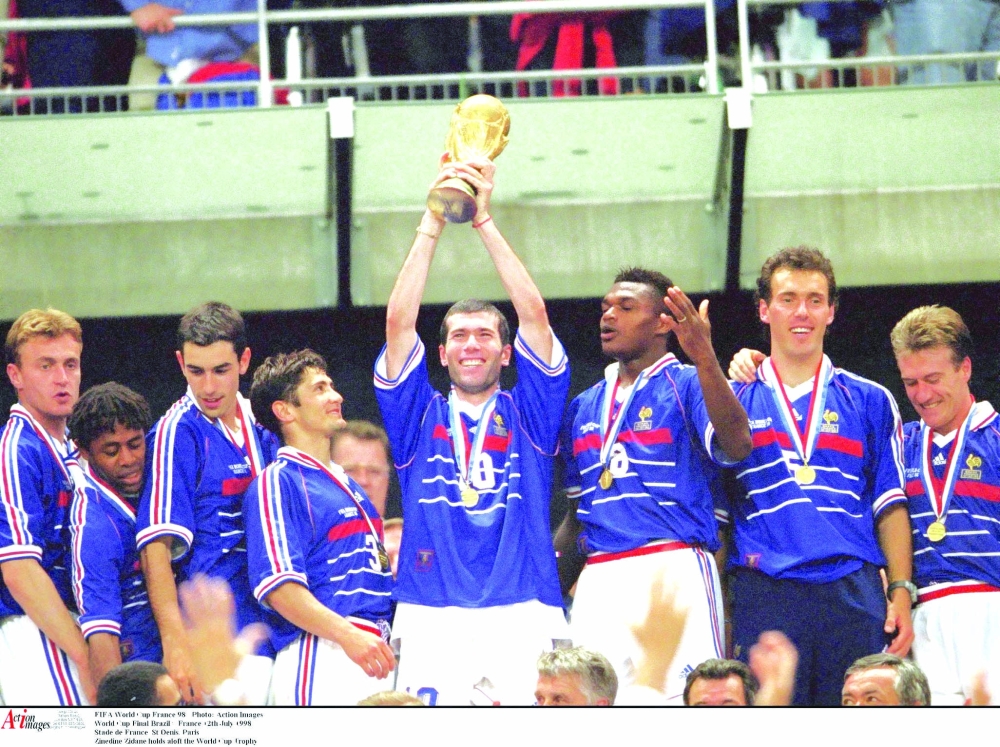 FILE PHOTO: 1998 Stade de France, Zinedine Zidane holds aloft the World Cup Trophy