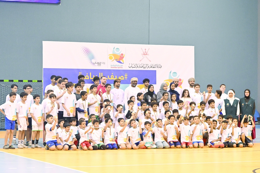 Participants and organisers pose for a group photo at the conclusion of the programme
