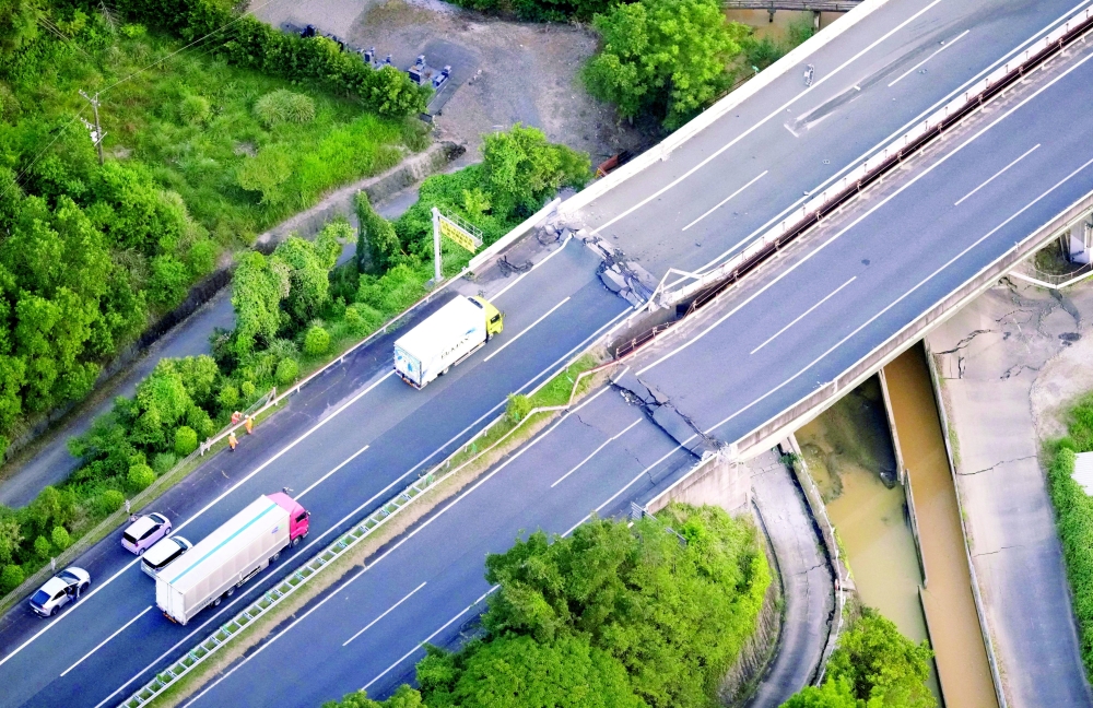 An aerial view shows the damaged Kyushu Expressway after an earthquake with a preliminary magnitude of 7.1 struck Japan's southern Kumamoto prefecture