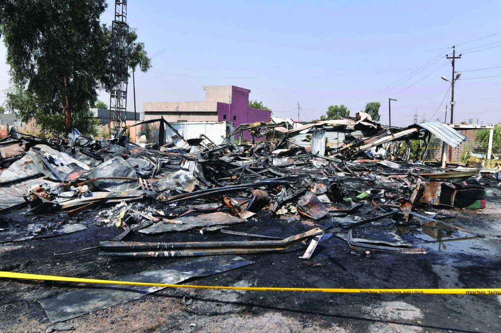 A general view of damaged structures at the site of a strike in Bartalla in the northern Iraqi Nineveh province 