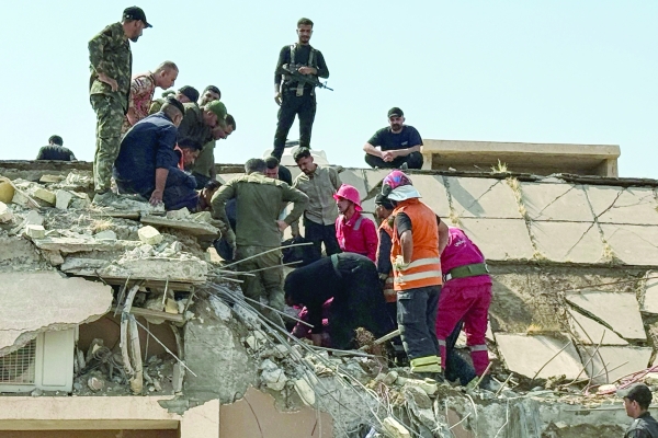 Fear of war’s spread as armed fighters struck in Iraq