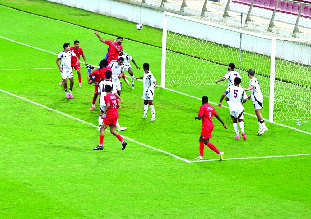 Action from Oman’s decisive qualifier against Qatar.