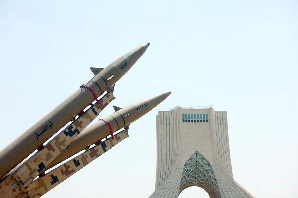 An Iranian missile system is displayed in Azadi Square in Tehran, Iran, on Thursday. — Reuters