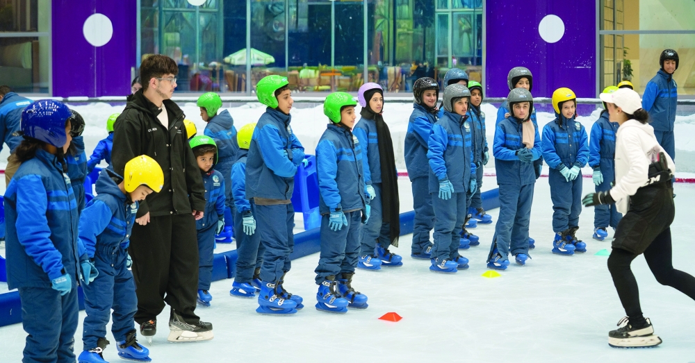 Participants learn the fundamentals of ice skating during the summer training sessions.