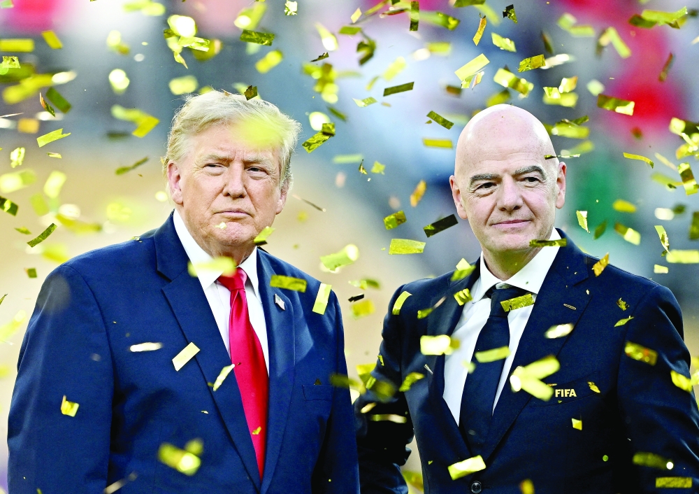 US President Donald Trump and Fifa President Gianni Infantino during the trophy presentation after the match. — Reuters