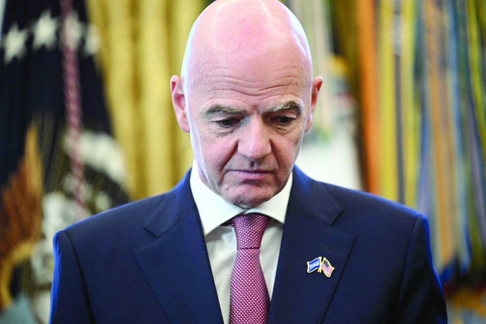 FIFA president Gianni Infantino looks on during a meeting with the White House Task Force on the FIFA World Cup 2026 in the Oval Office of the White House in Washington, DC on November 17, 2025. FIFA president Gianni Infantino has lost the "confidence" of the UEFA, European football's governing body, it said in a statement on August 1, 2026, after his plan to allow private investment in the World Cup was withdrawn following a global backlash.
 (Photo by Brendan SMIALOWSKI / AFP)