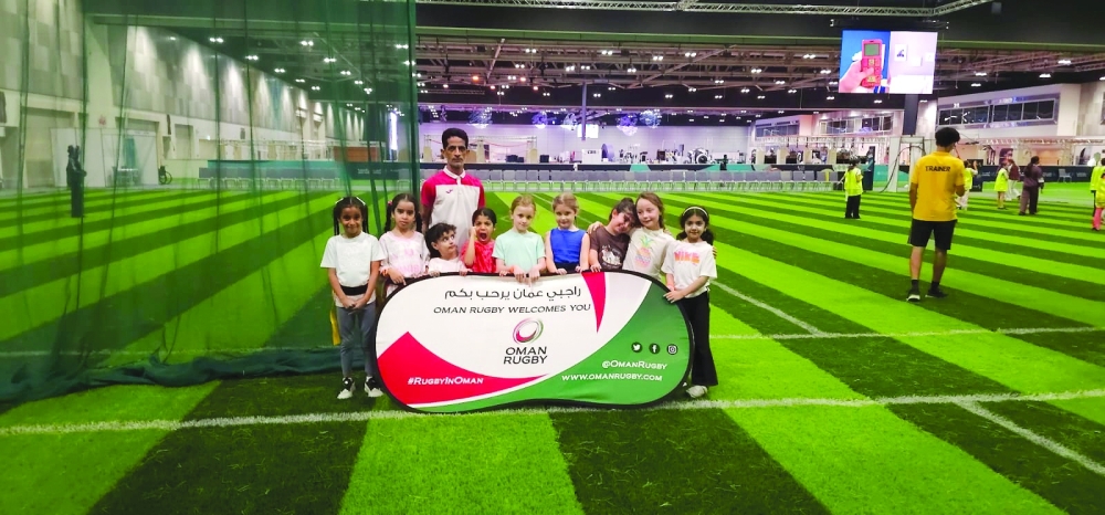 Young participants learn the basic skills of touch rugby during Sports Spark 2026 at the Oman Convention and Exhibition Centre.
