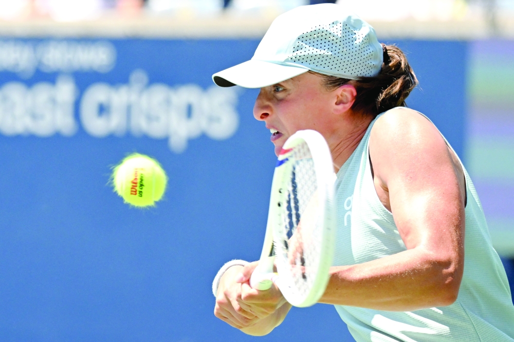 Iga Swiatek (POL) plays a shot against Sara Bejlek (CZE) during second round play at Sobeys Stadium.  — Imagn Images