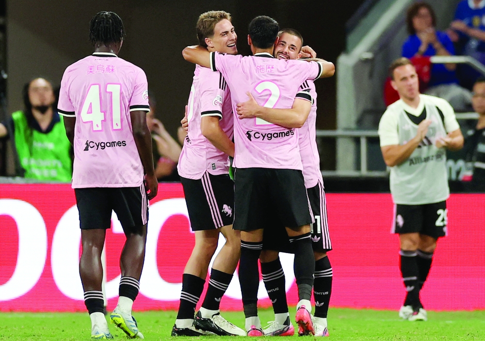 Juventus' Edon Zhegrova celebrates scoring their first goal with Kenan Yildiz and Marco Palestra in Hong Kong. — Reuters