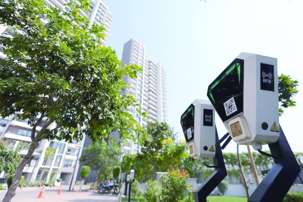 Electric Vehicle(EV) charging units are seen at a parking lot of Sobha city, a real estate property in Gurugram, India
