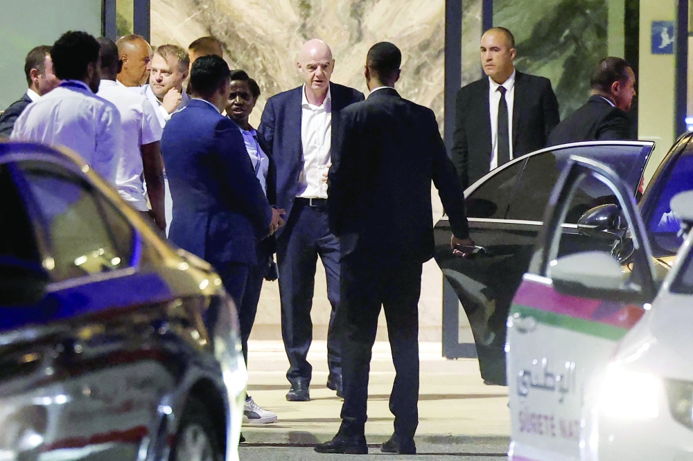 Fifa President Gianni Infantino (C) leaves Al Madina Stadium in Rabat following the 2026 Women's Africa Cup of Nations match between Malawi and Zambia on August 5. — AFP