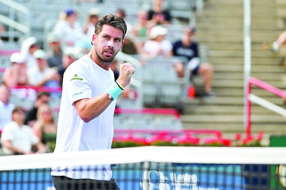 Cameron Norrie (GBR) reacts after scoring a point against Alex De Minaur (AUS) in third round play at IGA Stadium in Montreal, Canada. — Imagn Images