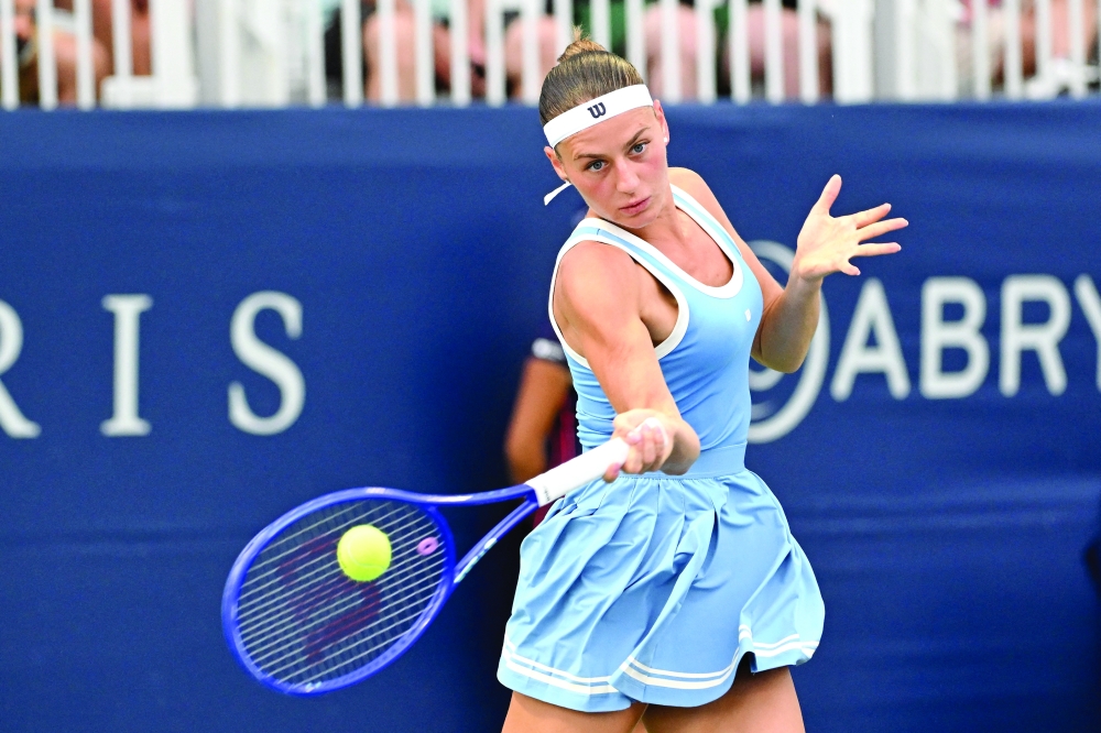 Marta Kostyuk (UKR) plays a shot against Madison Keys (USA) during third round play at Sobeys Stadium. — Imagn Images