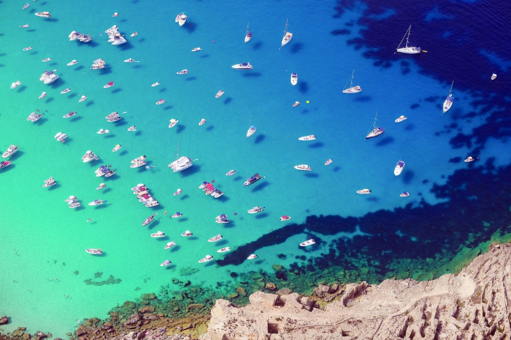 Boats gather in the waters off Favignana where Christopher Nolan’s "The Odyssey" was filmed. —Reuters
