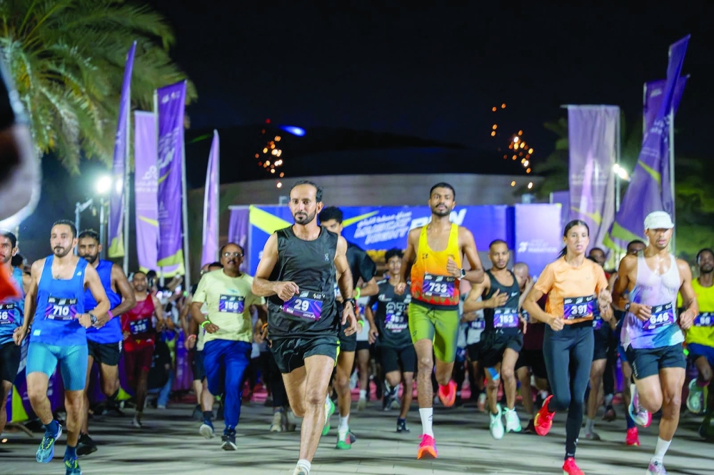 Participants compete during the second edition of the Muscat Night Run at Madinat Al Irfan.
