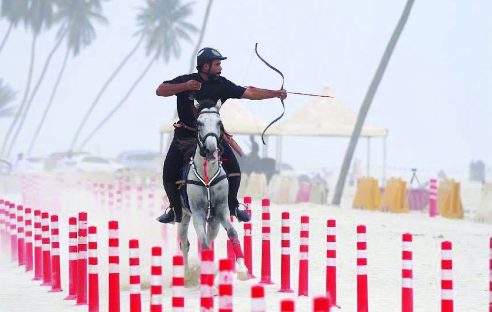 Sami al Hadadi in action on his way to claiming the overall title at the Dhofar Horseback Archery Championship.