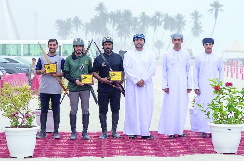 The top-ranked riders pose with their awards following the conclusion of the Dhofar Horseback Archery Championship.