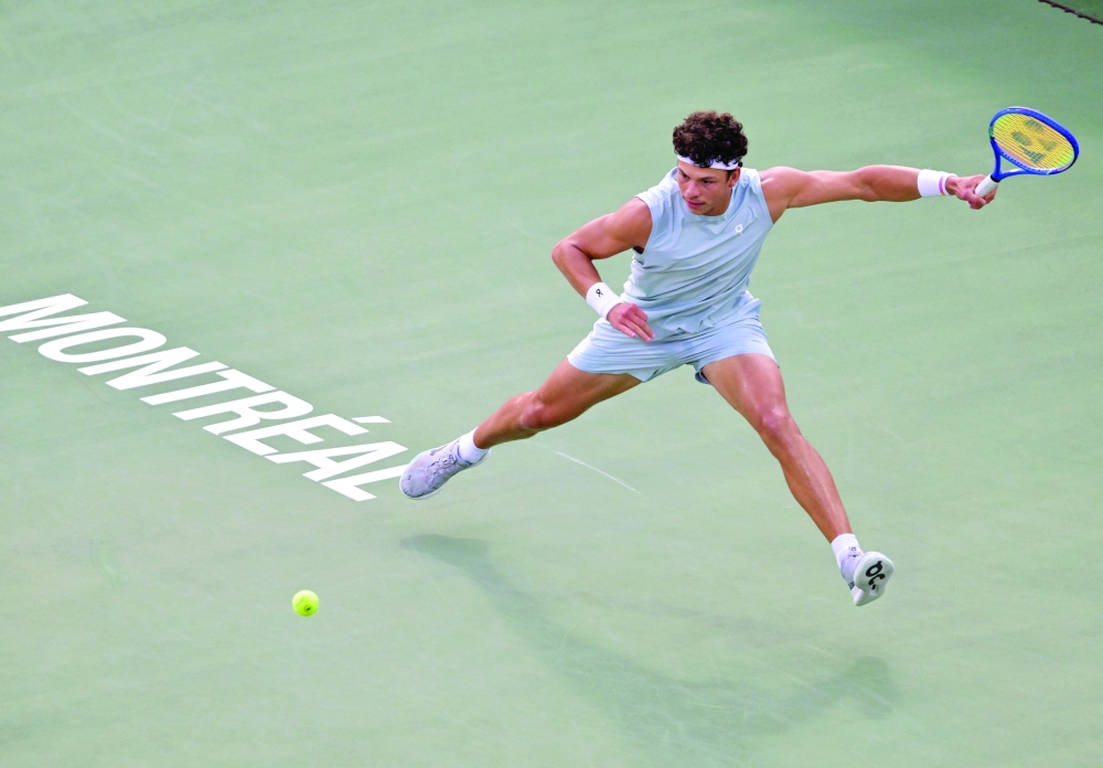Ben Shelton (USA) hits a forehand against Joao Fonseca (BRA) during round of sixteen play at IGA Stadium. — Imagn Images