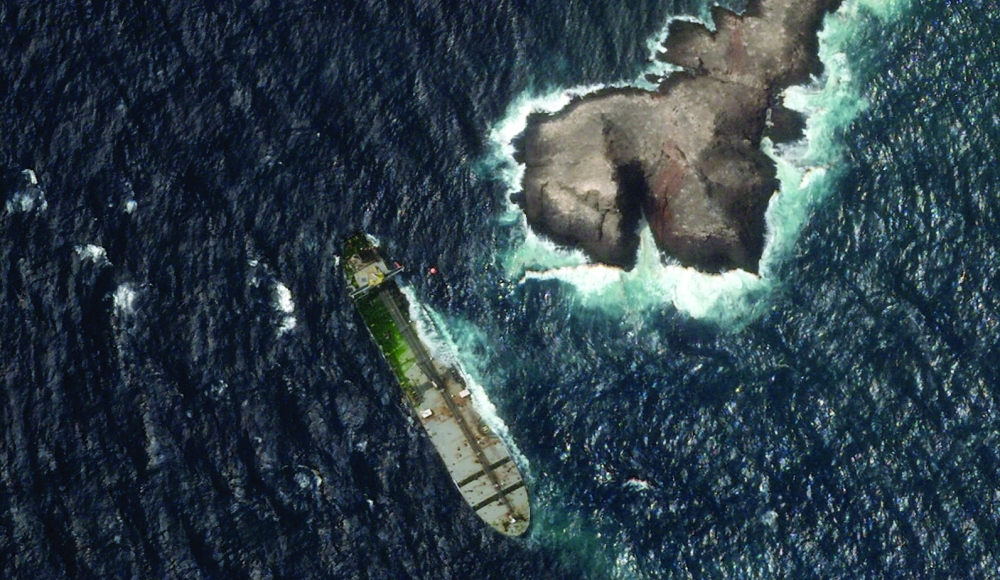 A satellite image shows the vessel Caroline Bezengi appeared to be covered in a coat of algae, off the Hallaniyat Islands in Dhofar Governorate.
