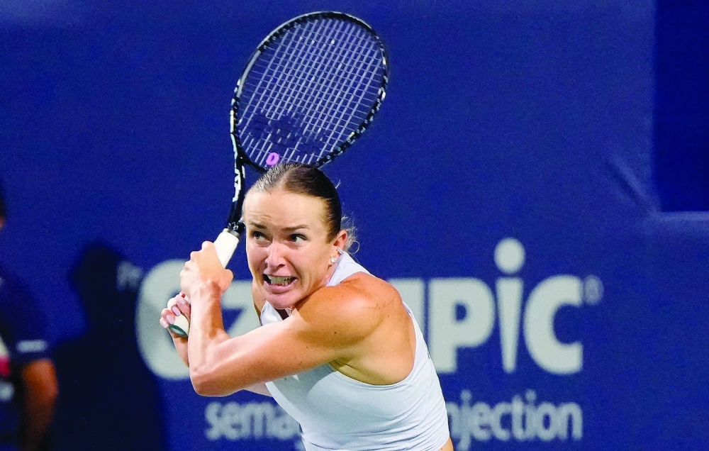 Elina Svitolina (UKR) hits a ball to Ekaterina Alexandrova during their quarterfinal at the National Bank Open at Sobeys Stadium. — Imagn Images
