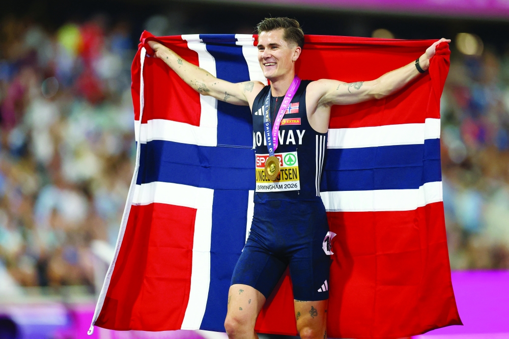 Norway's Jakob Ingebrigtsen celebrates after winning the gold medal in the men's 5000m final at the European Athletics Championships - Alexander Stadium, Birmingham, Britain. — Reuters