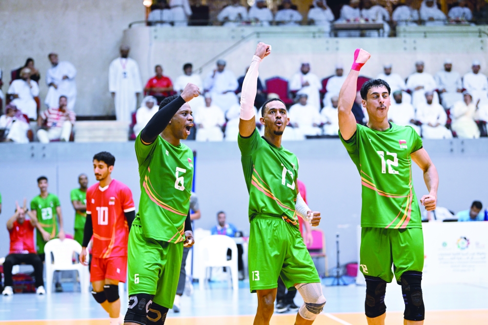 Oman players celebrate after defeating Qatar in straight sets to claim the 2nd West Asia Men’s Volleyball Championship title in Muscat.