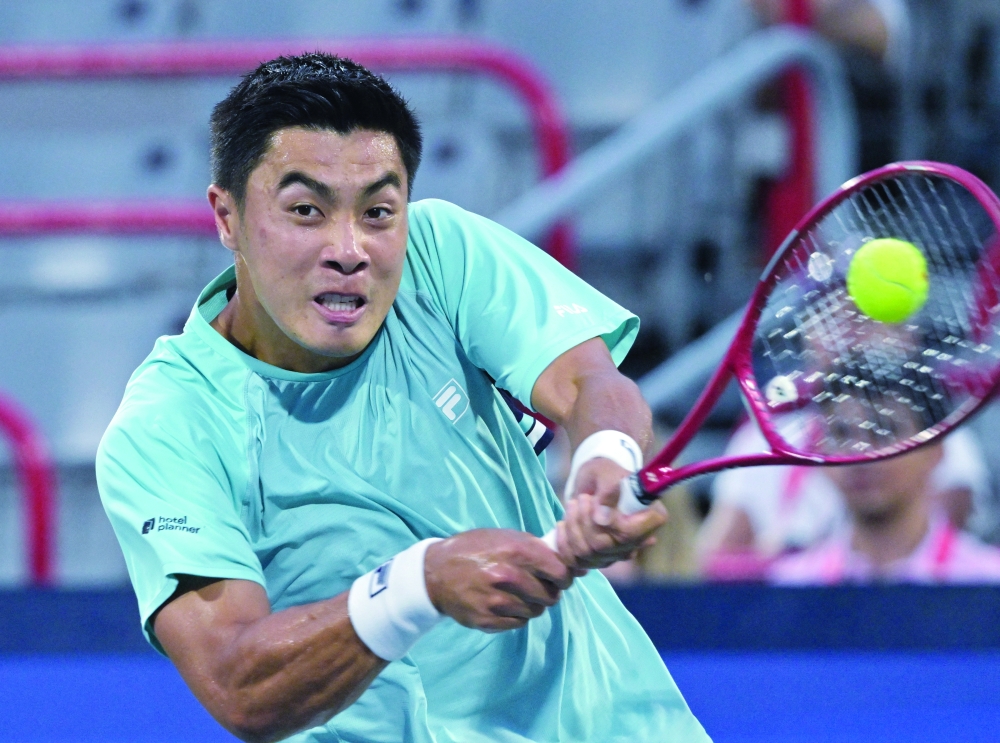 Brandon Nakashima (USA) hits a backhand against Arthur Rinderknech (FRA) during Round of 16 at IGA Stadium. — Imagn Images
