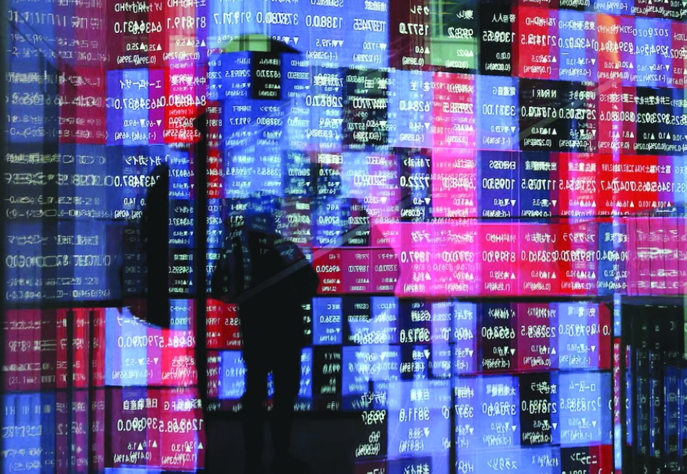 Global stocks rise as oil slips below $90 and dollar gains.