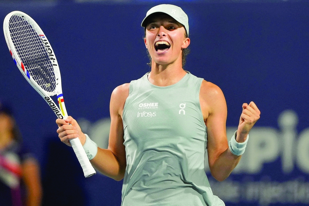 Iga Swiatek (POL) reacts after defeating Elina Svitolina in their semifinal at the National Bank Open at Sobeys Stadium. — Imagn Images