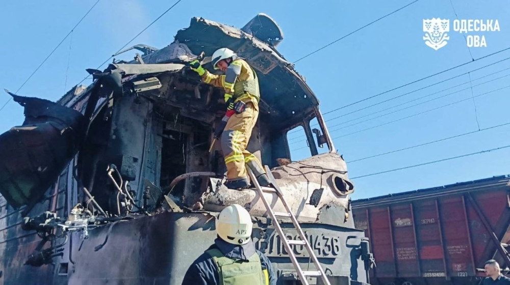 Rescuers work at the site of a locomotive of a passenger train which was hit by a Russian drone strike, amid Russia's attack on Ukraine, in Odesa region, Ukraine. — Reuters