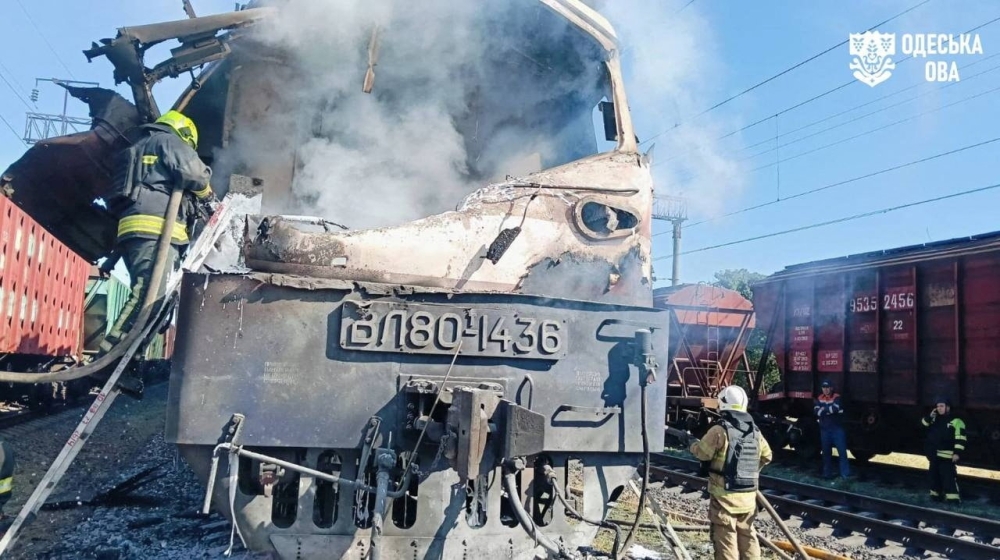 Firefighters extinguish a locomotive of a passenger train which was hit by a Russian drone strike, amid Russia's attack on Ukraine, in the Odesa region, Ukraine. — Reuters