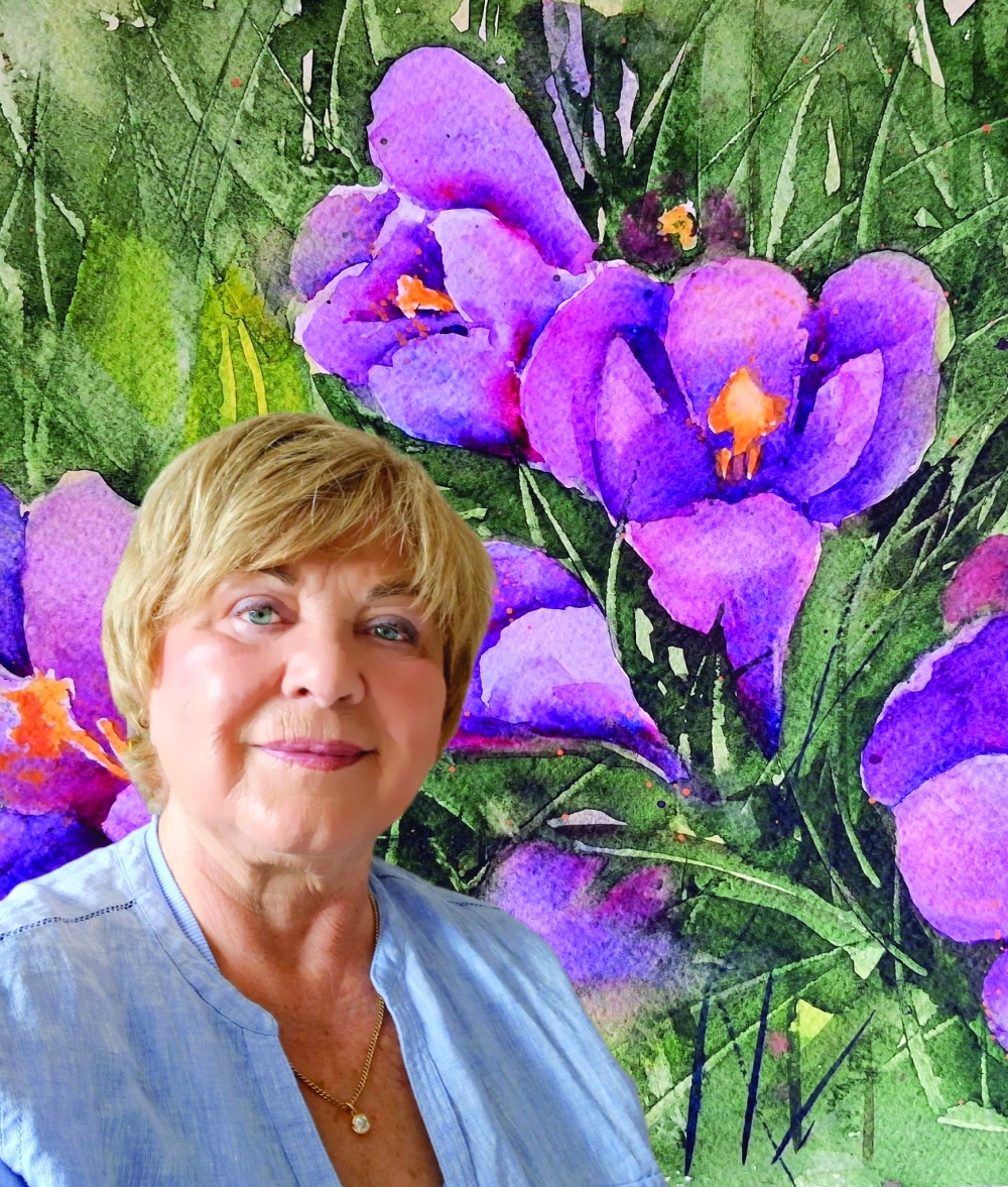 Artist Lubica Ritzl with her vibrant watercolour of purple crocuses