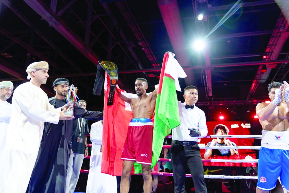 Muneer al Mishaykhi celebrates after claiming victory in the main bout at OCEC.