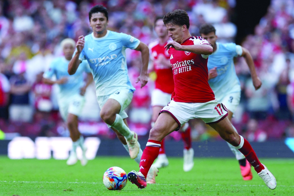 Arsenal's Greek striker Christos Tzolis controls the ball during the English FA Community Shield football match between Arsenal and Manchester City at The Principality Stadium. — AFP