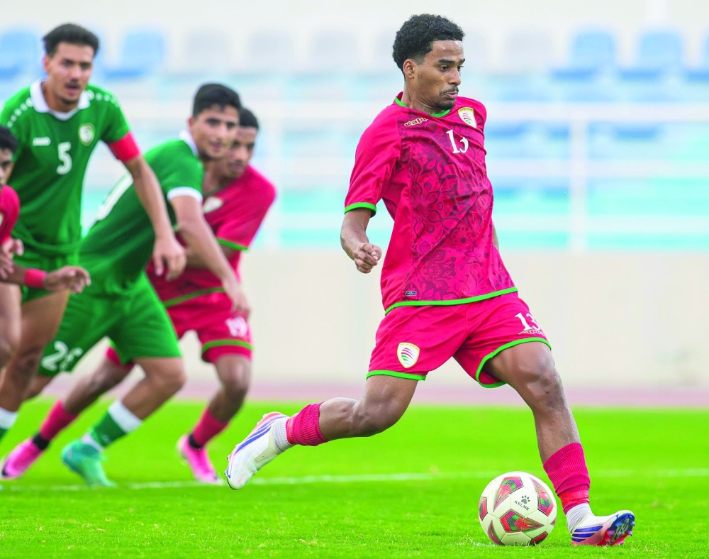 The young Red Warriors battle for possession during their 2-1 friendly defeat to Syria.