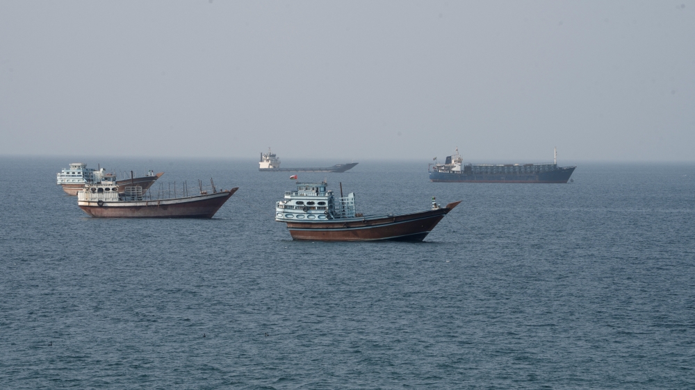 Vessels near the Strait of Hormuz, as seen from Musandam, Oman, August 17, 2026 