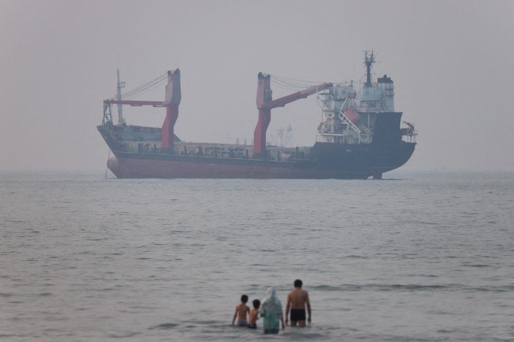 A vessel in the Strait of Hormuz near the beach of Bandar Abbas, Iran, June 30, 2026.