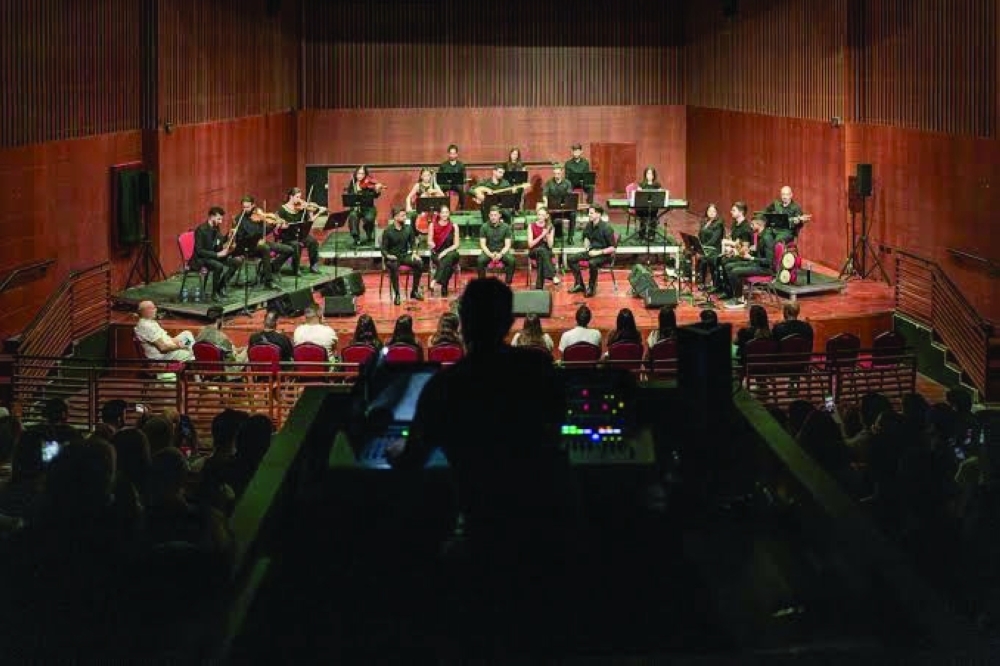 Palestinian musicians perform on stage during the Jerusalem Festival, held at the Yabous Cultural Centre. — AFP