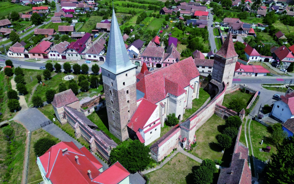 An aerial view of the fortified church in the village of Mosna, Romania, on August 7, 2026. Built in the late Middle Ages to provide shelter from attacks. — AFP