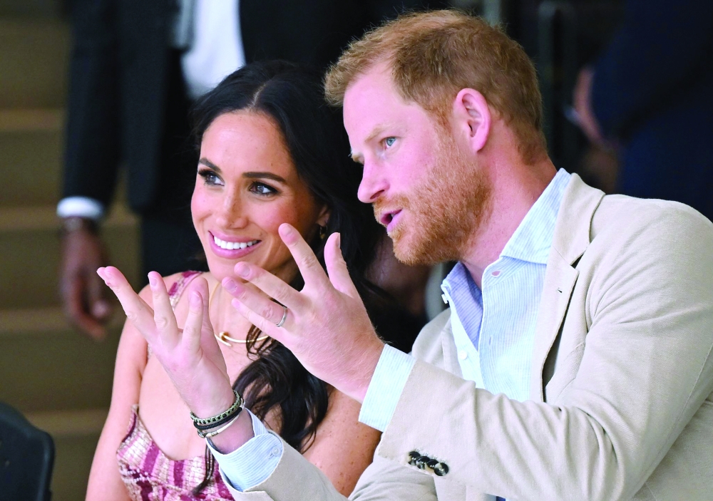 Prince Harry, Duke of Sussex, with his wife Meghan Markle.