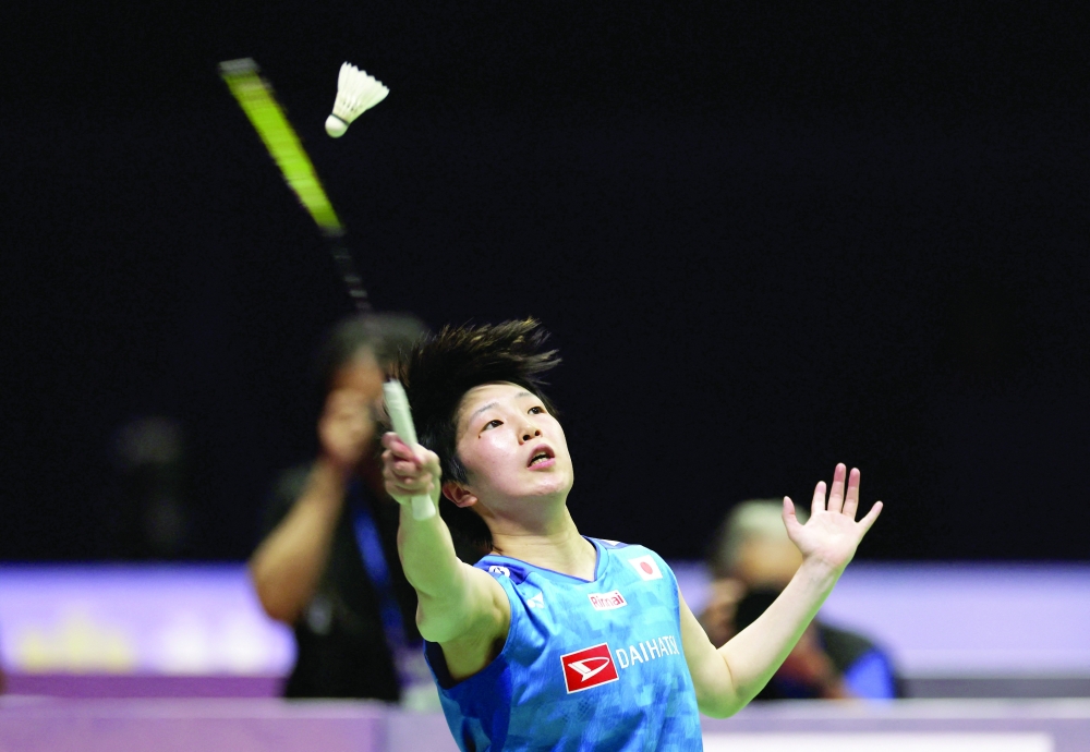 Japan's Akane Yamaguchi in action during her quarterfinal against Canada's Michelle Li in New Delhi. — Reuters