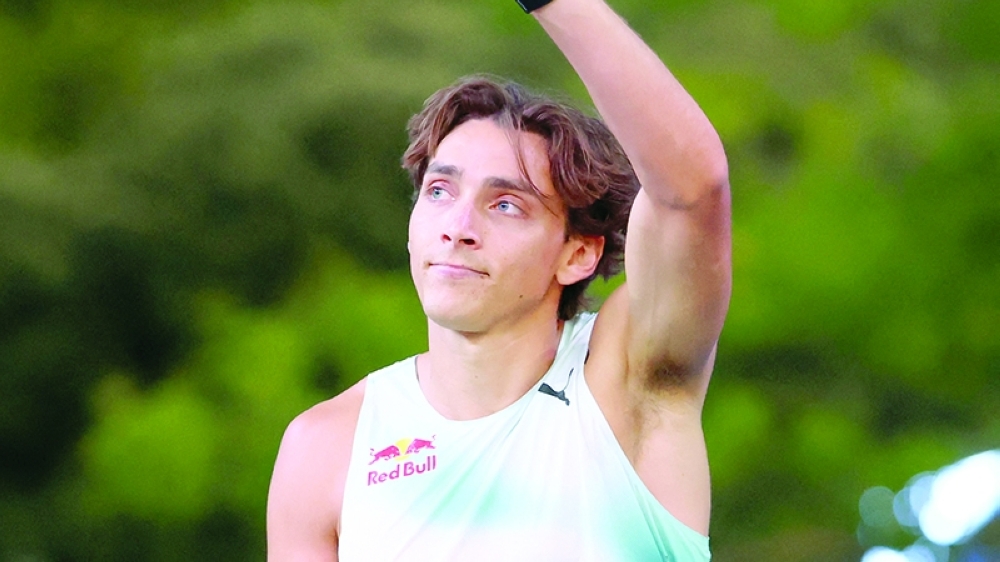 Sweden's Armand Duplantis acknowledges fans after retiring as the winner of the men's pole vault, as he fails to clear 6.32 metres. — Reuters