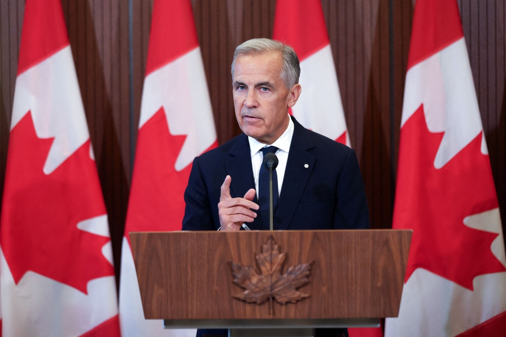 Canadian Prime Minister Mark Carney speaks at a press conference in Ottawa. — AFP