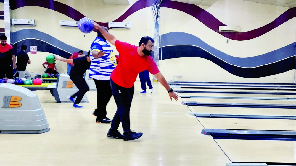 Participants compete in the Open Championship as action gets under way at the Dhofar Bowling Centre.
